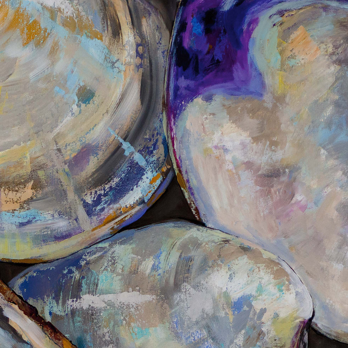 Close-up on a colorfully painted depiction of clam shells on a textured surface
